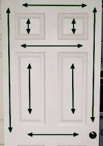 Direction of wood grain on smooth metal door.