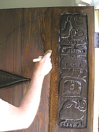 Applying Varnish to the Custom Wood Doors.