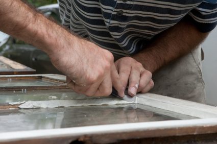 Reglazing a wood window sash.