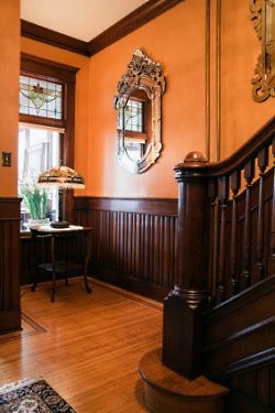 Interior Wood Stain Colors-Foyer with Wainscoting, Wooden Stairway in Restored Ornate Victorian Home